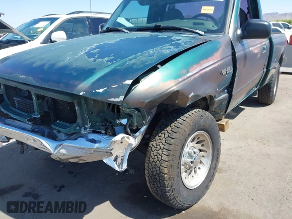 1999 Ford Ranger XL z VIN 1FTYR10V0XPA61389, wystawiony jako IAAI lot #42282825 z przebiegiem 235 720 mil mil oraz . Historia ofert i sprzedaży dostępna na DreamBid. Obrazek 6.