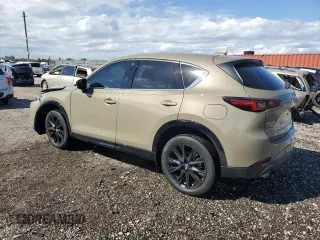 2024 Mazda CX-5 2.5 Carbon Turbo with VIN JM3KFBAYXR0521660, listed as a Copart auction lot 42415895 with 4,857 mi miles and Clean Title. Bid and sale history available at carsss.com. Image 2.
