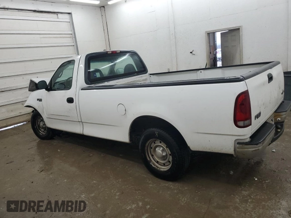 2000 Ford F-150 XL with VIN 1FTRF17L7YNB52822, listed as a Copart auction lot 43421495 with 103,753 mi miles and Salvage title. Bid and sale history available at DreamBid. Image 2.