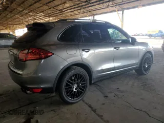 2012 Porsche Cayenne S Hybrid z VIN WP1AE2A27CLA92565, wystawiony jako Copart lot #82221214 z przebiegiem 130 210 mil mil oraz Szkody całkowita. Historia ofert i sprzedaży dostępna na DreamBid. Obrazek 3.