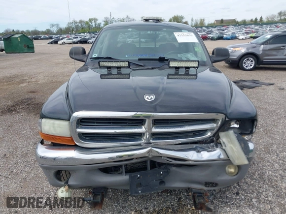 2004 Dodge Dakota SLT z VIN 1D7HG48N54S664848, wystawiony jako IAAI lot #42152635 z przebiegiem 153 824 mil mil oraz . Historia ofert i sprzedaży dostępna na DreamBid. Obrazek 12.