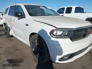 2017 Dodge Durango R/T with VIN 1C4SDHCT8HC736891, listed as a IAAI auction lot 41329282 with 92,738 mi miles. Bid and sale history available at carsss.com. Image 1.