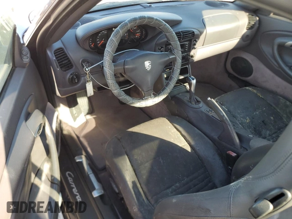 2000 Porsche 911 z VIN WP0AA2996YS621130, wystawiony jako Copart lot #77096434 z przebiegiem Nie podano mil oraz Szkoda całkowita • Salvage title. Historia ofert i sprzedaży dostępna na DreamBid. Obrazek 8.