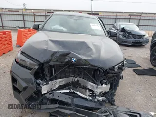 2024 BMW X6 M with VIN 5YM23ET07R9V10225, listed as a IAAI auction lot 40971354 with 1 mi miles. Bid and sale history available at carsss.com. Image 11.