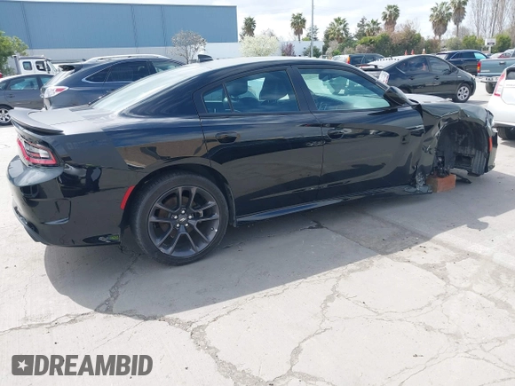2021 Dodge Charger R/T with VIN 2C3CDXCT4MH651945, listed as a IAAI auction lot 41861896 with 25,569 mi miles and . Bid and sale history available at carsss.com. Image 4.