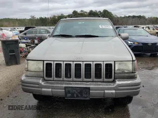 1997 Jeep Grand Cherokee Limited with VIN 1J4GZ78Y0VC682949, listed as a Copart auction lot 82152424 with 194,576 mi miles and Salvage Title. Bid and sale history available at carsss.com. Image 5.
