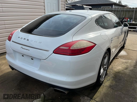 2013 Porsche Panamera z VIN WP0AA2A74DL016182, wystawiony jako Copart lot #79581904 z przebiegiem 119 089 mil mil oraz Szkoda całkowita • Salvage title. Historia ofert i sprzedaży dostępna na DreamBid. Obrazek 4.
