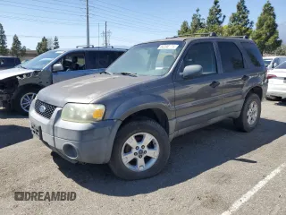 2005 Ford Escape XLT with VIN 1FMYU03155KB11291, listed as a Copart auction lot 52246495 with Not provided miles and Salvage title. Bid and sale history available at DreamBid. Image 1.