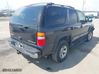 2003 Chevrolet Tahoe Z71 with VIN 1GNEK13Z13R166468, listed as a IAAI auction lot 41848131 with 163,738 mi miles. Bid and sale history available at carsss.com. Image 4.