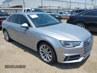2019 Audi A4 Premium z VIN WAUGMAF48KN004870, wystawiony jako IAAI lot #42262134 z przebiegiem 74 501 mil mil oraz . Historia ofert i sprzedaży dostępna na DreamBid. Obrazek 1.