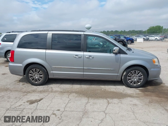 2014 Chrysler Town & Country Touring-L with VIN 2C4RC1CG2ER107917, listed as a IAAI auction lot 42180194 with 169,447 mi miles. Bid and sale history available at carsss.com. Image 13.
