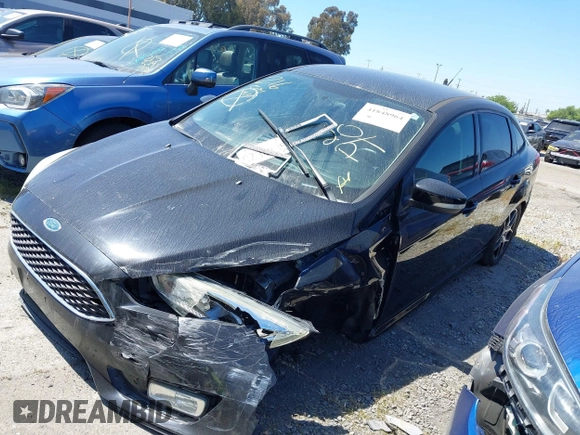2016 Ford Focus SE with VIN 1FADP3F23GL254047, listed as a IAAI auction lot 41848964 with 79,432 mi miles and . Bid and sale history available at carsss.com. Image 2.