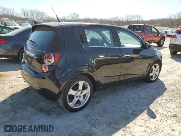 2012 Chevrolet Sonic LTZ z VIN 1G1JE6SHXC4206797, wystawiony jako Copart lot #48520535 z przebiegiem 117 350 mil mil oraz Czysty tytuł • Clean title. Historia ofert i sprzedaży dostępna na DreamBid. Obrazek 3.