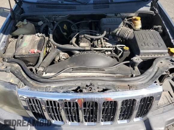 2003 Jeep Grand Cherokee Laredo with VIN 1J4GX48S73C539185, listed as a Copart auction lot 46687915 with 265,008 mi miles and Salvage Title. Bid and sale history available at carsss.com. Image 12.