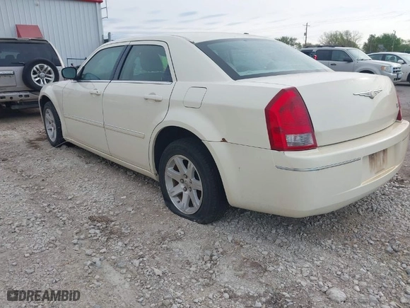 2007 Chrysler 300 Touring with VIN 2C3LA53G07H658041, listed as a IAAI auction lot 42014510 with 169,478 mi miles. Bid and sale history available at carsss.com. Image 3.