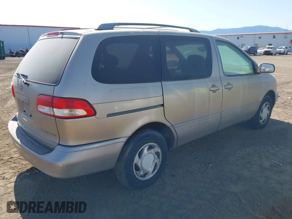 2002 Toyota Sienna LE with VIN 4T3ZF13C72U419558, listed as a IAAI auction lot 42531912 with 246,872 mi miles and . Bid and sale history available at DreamBid. Image 4.