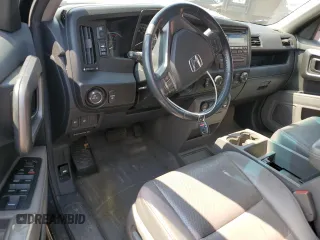 2010 Honda Ridgeline RTL with VIN 5FPYK1F5XAB004153, listed as a Copart auction lot 59710535 with Not provided miles and Salvage title. Bid and sale history available at DreamBid. Image 8.