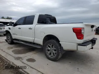 2017 Nissan Titan XD SL with VIN 1N6BA1F26HN520459, listed as a Copart auction lot 79275354 with 180,118 mi miles and Salvage Title. Bid and sale history available at carsss.com. Image 2.
