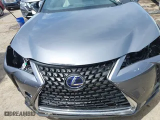 2021 Lexus UX with VIN JTHP9JBH1M2040593, listed as a IAAI auction lot 42024493 with 33,394 mi miles. Bid and sale history available at carsss.com. Image 6.
