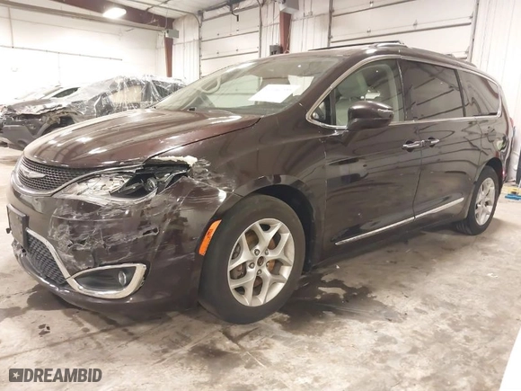 2017 Chrysler Pacifica Touring-L with VIN 2C4RC1BGXHR656447, listed as a IAAI auction lot 41046799 with 187,135 mi miles. Bid and sale history available at carsss.com. Image 2.