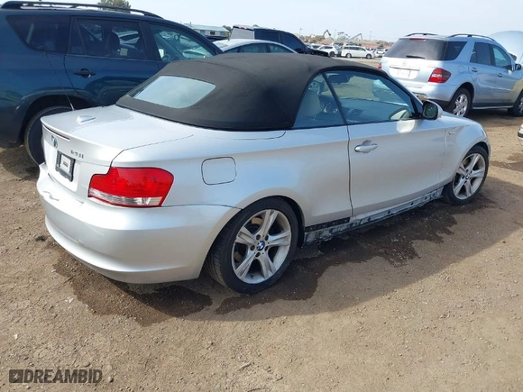 2010 BMW 1 Series 128i with VIN WBAUL7C58AVJ78135, listed as a IAAI auction lot 41615767 with 107,384 mi miles. Bid and sale history available at carsss.com. Image 4.