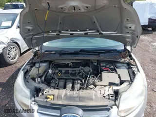 2012 Ford Focus SE with VIN 1FAHP3F22CL115877, listed as a IAAI auction lot 42031223 with 138,743 mi miles. Bid and sale history available at carsss.com. Image 10.