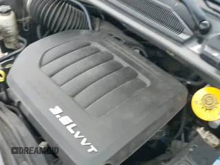 2014 Dodge Grand Caravan SXT with VIN 2C4RDGCG0ER121671, listed as a IAAI auction lot 43192664 with 172,788 mi miles and . Bid and sale history available at DreamBid. Image 20.