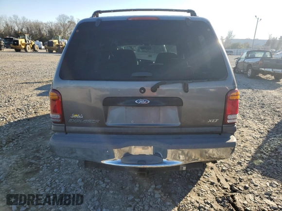 1999 Ford Explorer XL with VIN 1FMZU34X8XUC31019, listed as a Copart auction lot 87831635 with 220,683 mi miles and Salvage title. Bid and sale history available at DreamBid. Image 6.