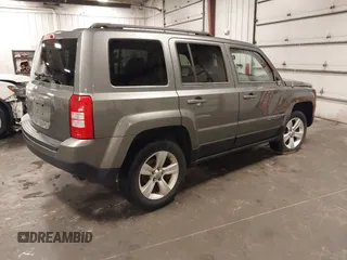 2012 Jeep Patriot Sport with VIN 1C4NJRBB1CD562668, listed as a IAAI auction lot 42463536 with 236,301 mi miles and . Bid and sale history available at DreamBid. Image 4.