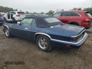 1995 Jaguar XJS with VIN SAJNX2741SC198516, listed as a Copart auction lot 69795314 with 75,227 mi miles and Salvage Title. Bid and sale history available at carsss.com. Image 2.