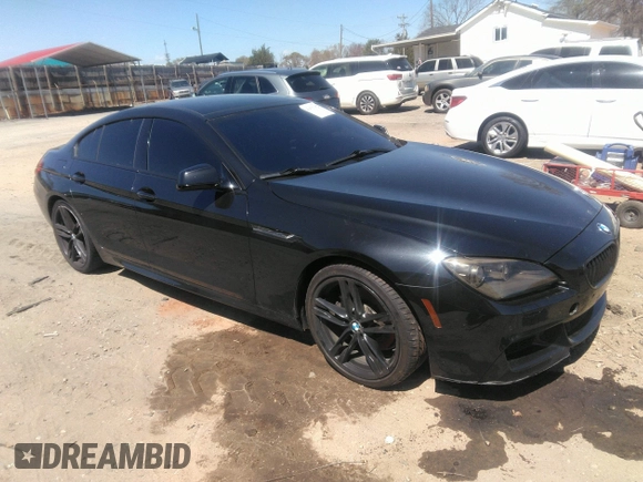 2014 BMW 6 Series 640i z VIN WBA6A0C57EDZ04682, wystawiony jako IAAI lot #41891362 z przebiegiem 140 478 mil mil oraz . Historia ofert i sprzedaży dostępna na DreamBid. Obrazek 1.