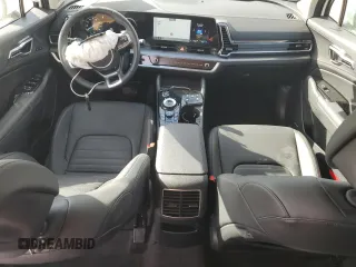 2025 Kia Sportage SX-Prestige with VIN KNDPXCDG1S7177587, listed as a Copart auction lot 42723205 with 6,704 mi miles and Salvage title. Bid and sale history available at DreamBid. Image 8.
