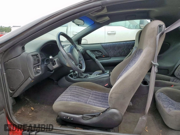 2002 Chevrolet Camaro z VIN 2G1FP22K322135404, wystawiony jako Copart lot #58767305 z przebiegiem Nie podano mil oraz Czysty tytuł • Clean title. Historia ofert i sprzedaży dostępna na DreamBid. Obrazek 7.