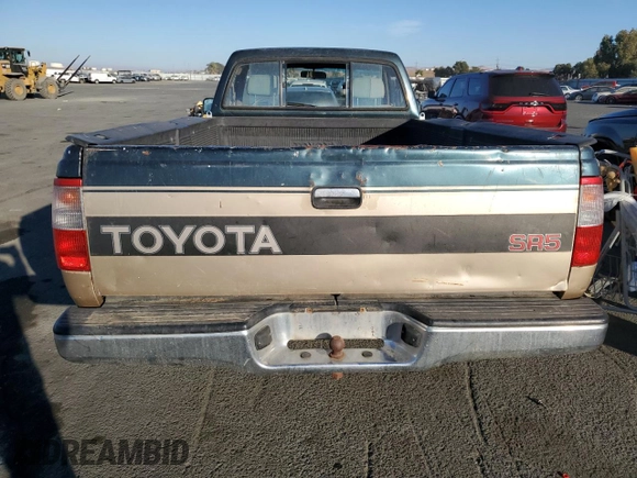 1993 Toyota T100 z VIN JT4VD10C2P0007486, wystawiony jako Copart lot #77669724 z przebiegiem 150 936 mil mil oraz Tytuł czysty. Historia ofert i sprzedaży dostępna na DreamBid. Obrazek 6.