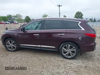 2015 Infiniti QX60 with VIN 5N1AL0MM7FC521700, listed as a IAAI auction lot 42310389 with 144,217 mi miles and . Bid and sale history available at DreamBid. Image 14.