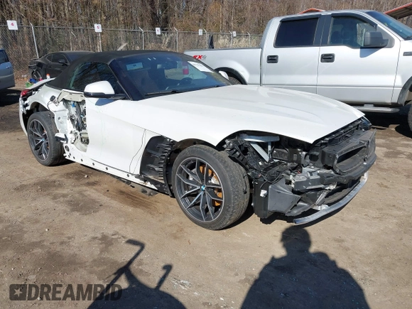 2020 BMW Z4 sDrive30i z VIN WBAHF3C09LWW54993, wystawiony jako IAAI lot #41757841 z przebiegiem Nie podano mil oraz . Historia ofert i sprzedaży dostępna na DreamBid. Obrazek 6.