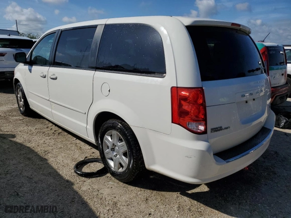 2012 Dodge Grand Caravan SXT with VIN 2C4RDGBG9CR405203, listed as a Copart auction lot 73689184 with 42,959 mi miles and Salvage Title. Bid and sale history available at carsss.com. Image 2.