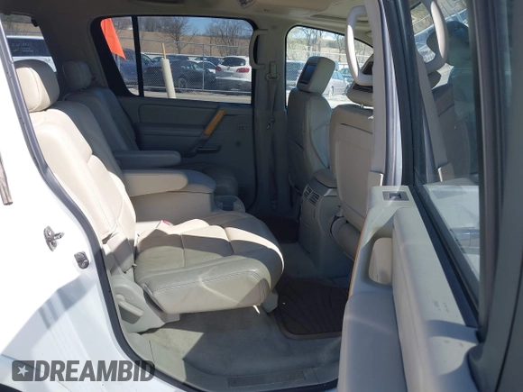 2004 Infiniti QX56 with VIN 5N3AA08CX4N809761, listed as a IAAI auction lot 42041581 with 136,941 mi miles. Bid and sale history available at carsss.com. Image 8.