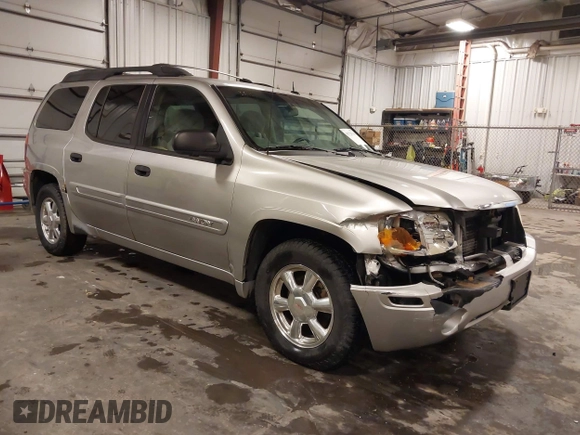 2005 GMC Envoy SLE with VIN 1GKET16S656102522, listed as a IAAI auction lot 41729310 with 233,049 mi miles. Bid and sale history available at carsss.com. Image 1.