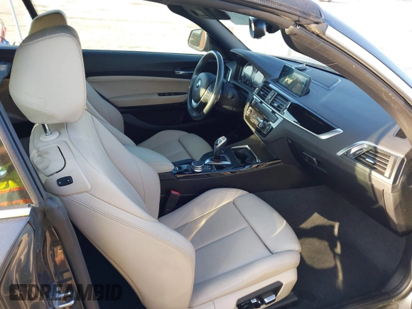 2020 BMW 2 Series 230i xDrive with VIN WBA2K1C08L7G28887, listed as a IAAI auction lot 42122785 with 30,599 mi miles and . Bid and sale history available at carsss.com. Image 5.