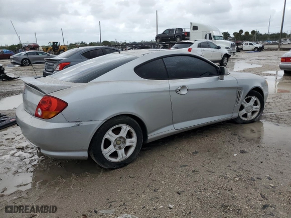 2003 Hyundai Tiburon GT with VIN KMHHN65F23U084299, listed as a Copart auction lot 75105394 with 90,598 mi miles and Clean Title. Bid and sale history available at carsss.com. Image 3.
