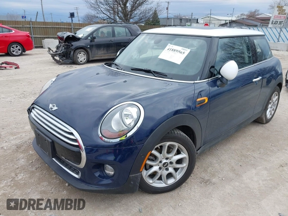 2017 MINI Hardtop Cooper with VIN WMWXP5C34H3B15966, listed as a IAAI auction lot 41889565 with 21,579 mi miles and . Bid and sale history available at DreamBid. Image 2.
