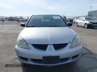 2004 Mitsubishi Lancer ES with VIN JA3AJ26E54U052124, listed as a IAAI auction lot 41804473 with 165,786 mi miles. Bid and sale history available at carsss.com. Image 13.
