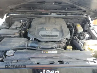 2014 Jeep Wrangler Sport z VIN 1C4AJWAG0EL147523, wystawiony jako Copart lot #59682015 z przebiegiem 196 258 mil mil oraz Szkoda całkowita • Salvage title. Historia ofert i sprzedaży dostępna na DreamBid. Obrazek 11.