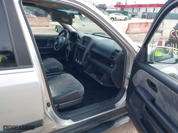 2003 Honda CR-V EX with VIN SHSRD78893U138102, listed as a IAAI auction lot 41948534 with 253,944 mi miles. Bid and sale history available at carsss.com. Image 5.