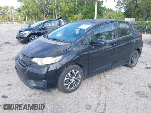 2016 Honda Fit LX with VIN JHMGK5H59GS002090, listed as a IAAI auction lot 41761887 with 97,577 mi miles. Bid and sale history available at carsss.com. Image 20.