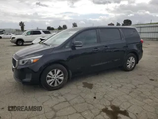 2016 Kia Sedona L with VIN KNDMA5C10G6184184, listed as a Copart auction lot 50974325 with 144,549 mi miles and Salvage Title. Bid and sale history available at carsss.com. Image 1.