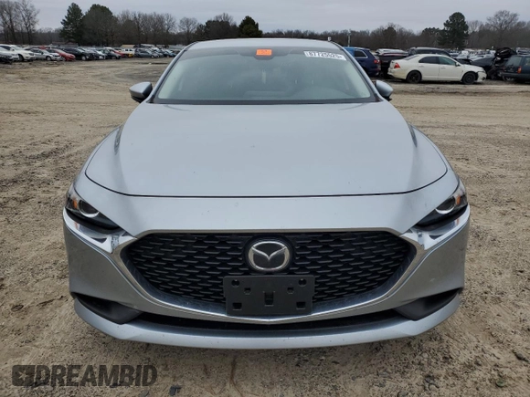 2021 Mazda 3 2.0 with VIN JM1BPAA78M1314033, listed as a Copart auction lot 87725525 with 58,876 mi miles and Salvage Title. Bid and sale history available at DreamBid. Image 5.
