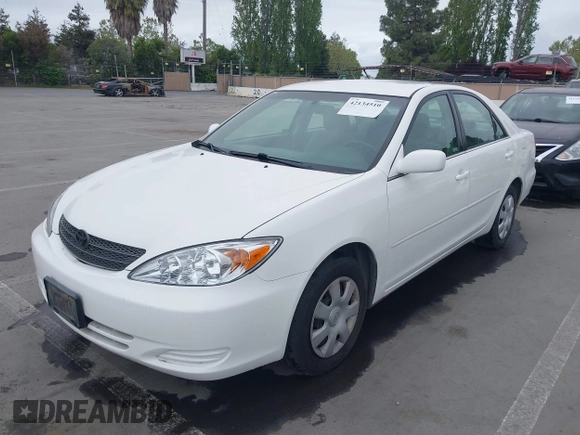 2004 Toyota Camry LE with VIN 4T1BE32K84U362436, listed as a IAAI auction lot 42134510 with 199,371 mi miles. Bid and sale history available at carsss.com. Image 6.