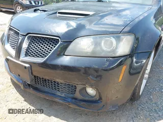 2008 Pontiac G8 z VIN 6G2ER57708L129191, wystawiony jako IAAI lot #42468013 z przebiegiem 133 134 mil mil oraz . Historia ofert i sprzedaży dostępna na DreamBid. Obrazek 13.
